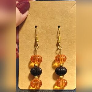 Orange and black dangle earrings